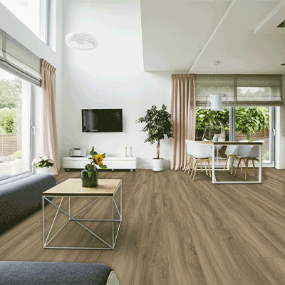 luxury vinyl plank flooring in living room with pink drapes